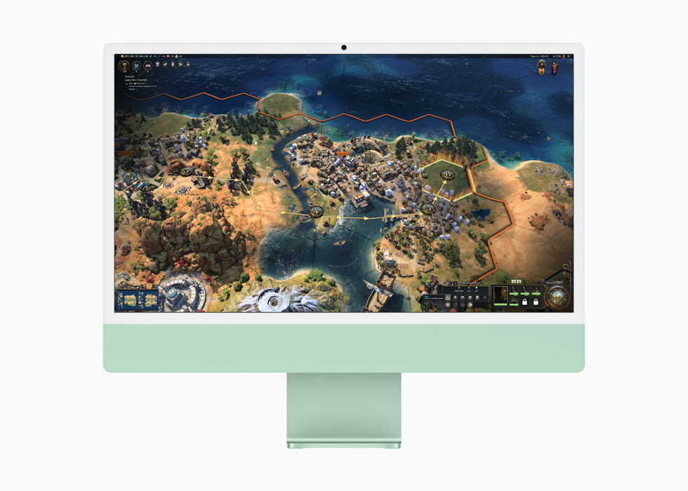 Trên chiếc iMac màu xanh lá cây, người dùng đang chơi Civilization VII.